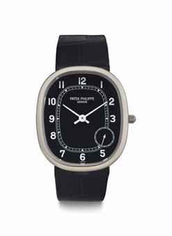 Patek Philippe. A Large 18k White Gold Oval-Shaped Automatic Wristwatch