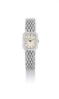 PATEK PHILIPPE. A LADY'S FINE 18K WHITE GOLD AND DIAMOND-SET RECTANGULAR BRACELET WATCH