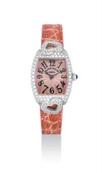 FRANCK MULLER. A LADY'S 18K WHITE GOLD AND DIAMOND-SET TONNEAU-SHAPED WRISTWATCH
