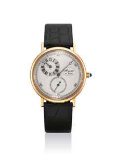 BREGUET. A FINE AND RARE 18K PINK GOLD WRISTWATCH WITH REGULATOR DIAL