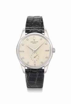 Patek Philippe. A very attractive and extremely rare platinum automatic wristwatch with diamond-set dial