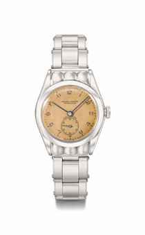 Rolex. A fine, rare and unusual stainless steel automatic wristwatch with pink dial and fancy hooded lugs