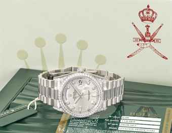 Rolex. A very rare and extremely attractive 18K white gold and diamond-set automatic wristwatch with date, day, sweep centre seconds, bracelet, Guarantee, sales tag and box, made for the Sultanate of Oman
