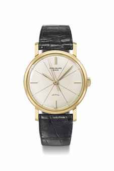 Patek Philippe. A fine, rare and attractive 18K gold wristwatch with sweep centre seconds