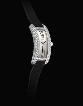 CARTIER. A LADY'S 18K WHITE GOLD AND DIAMOND-SET CURVED RECTANGULAR WRISTWATCH