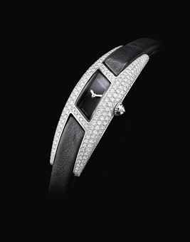 CARTIER. A LADY'S 18K WHITE GOLD AND DIAMOND-SET PARALLELOGRAM-SHAPED WRISTWATCH