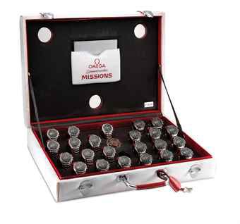 OMEGA. A FINE AND RARE COLLECTION OF 23 STAINLESS STEEL LIMITED EDITION CHRONOGRAPH WRISTWATCHES WITH BRACELET, A PLASTIC ENCASED DISPLAY CALIBRE AND SPACE SUIT CLOTH-COVERED SUITCASE, MADE TO COMMEMORATE THE SPEEDMASTER PROFESSIONAL'S 40TH ANNIVERSARY
