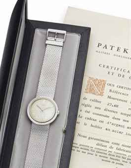 Patek Philippe. A Fine and Unusual Stainless Steel Wristwatch with Bracelet, Original Certificate of Origin, and Presentation Box