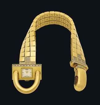 VAN CLEEF ARPELS. A VERY FINE AND ATTRACTIVE 18K GOLD AND DIAMOND-SET CADENAS-SHAPED BRACELET WATCH