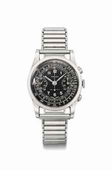 Rolex. A fine and very rare stainless steel chronograph wristwatch with black lacquer dial and bracelet