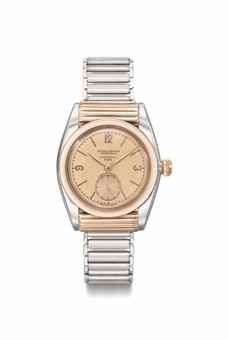 Rolex. A fine and rare stainless steel and pink gold automatic bubble back wristwatch with ribbed hooded lugs and pink dial