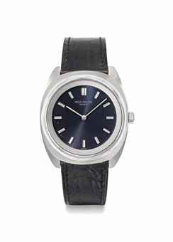 Patek Philippe. An unusual stainless steel tonneau-shaped wristwatch with blue dial and Original Certificate