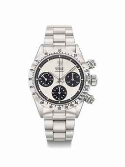 Rolex. A fine and very rare stainless steel chronograph wristwatch with so-called Panda Paul Newman dial, engraved case back, bracelet and box