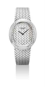 PATEK PHILIPPE. A FINE 18K WHITE GOLD AND DIAMOND-SET CUSHION-SHAPED BRACELET WATCH