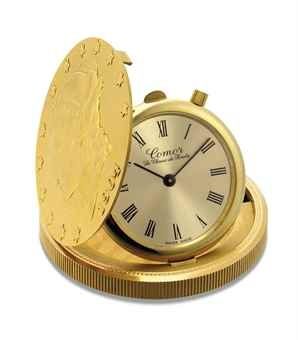 COMOR. AN 18K GOLD TWENTY DOLLAR COIN WATCH