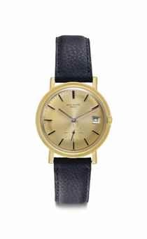 Patek Philippe. An 18k Gold Automatic Wristwatch with Date