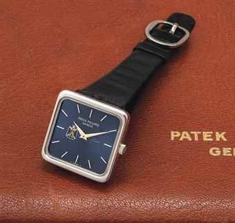 PATEK PHILIPPE. A RARE AND VERY FINE 18K WHITE GOLD SQUARE WRISTWATCH WITH IRAQI COAT OF ARMS, CERTIFICATE AND PERIOD BOX
