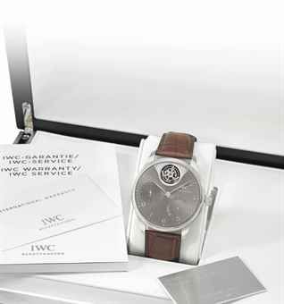 IWC. A fine, rare and large 18K white gold limited edition automatic tourbillon wristwatch with seven day power reserve, certificate and box
