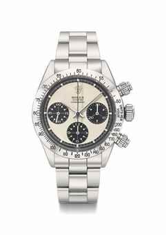 Rolex. A fine and very rare stainless steel chronograph wristwatch with “Panda” Paul Newman dial and bracelet