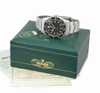 Rolex. A very fine and rare stainless steel automatic wristwatch with sweep centre seconds, bracelet, Rolex Service Centre receipt, blank guarantee, tag and box