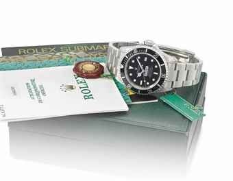 Rolex. A very rare stainless steel automatic wristwatch with sweep centre seconds, date, gas escape valve, hack feature, bracelet, Garantie, sales tag, diving table, tool and box, made for COMEX