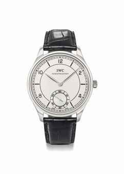 IWC. A fine, rare and large platinum limited edition minute wristwatch with certificate and box