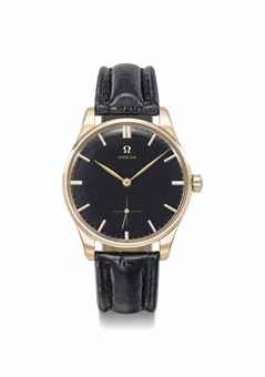 Omega. A fine and very elegant 18K pink gold wristwatch with black dial