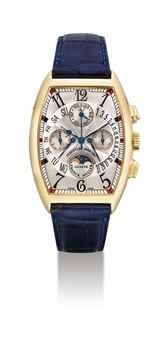 FRANCK MULLER. A FINE 18K GOLD TONNEAU-SHAPED AUTOMATIC BI-RETROGRADE PERPETUAL CALENDAR CHRONOGRAPH WRISTWATCH WITH MOON PHASES AND LEAP YEAR INDICATION