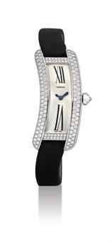 CARTIER. A LADY'S FINE 18K WHITE GOLD AND DIAMOND-SET CURVED RECTANGULAR WRISTWATCH