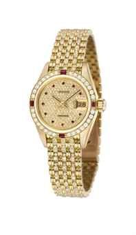 ROLEX. A LADY’S FINE AND RARE 18K GOLD, RUBY AND DIAMOND-SET AUTOMATIC WRISTWATCH WITH SWEEP CENTRE SECONDS, DATE AND BRACELET