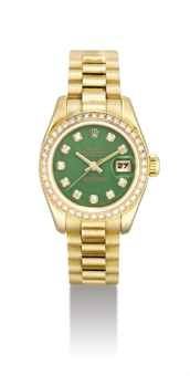 ROLEX. A LADY’S FINE 18K GOLD AND DIAMOND-SET AUTOMATIC WRISTWATCH WITH SWEEP CENTRE SECONDS, DATE, BRACELET AND GREEN HARD STONE DIAL