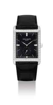 PATEK PHILIPPE. A FINE 18K WHITE GOLD AND DIAMOND-SET RECTANGULAR WRISTWATCH