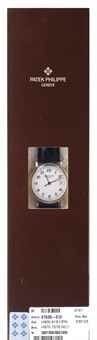 PATEK PHILIPPE. A FINE AND RARE 18K WHITE GOLD LIMITED EDITION AUTOMATIC WRISTWATCH WITH SWEEP CENTRE SECONDS, DATE, BREGUET NUMERALS, ORIGINAL CERTIFICATE AND BOX, DOUBLE FACTORY SEALED, MADE TO COMMEMORATE THE PATEK PHILIPPE WATCH ART GRAND EXHIBITION I
