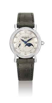 PATEK PHILIPPE. A LADY ’ S FINE 18K WHITE GOLD AND DIAMOND-SET WRISTWATCH WITH MOON PHASES