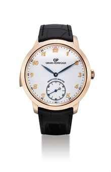GIRARD-PERREGAUX. A VERY FINE 18K PINK GOLD MINUTE REPEATING WRISTWATCH WITH BREGUET NUMERALS AND ENAMEL DIAL