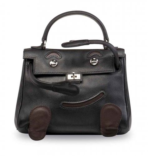 A LIMITED EDITION BLACK GULLIVER LEATHER QUELLE IDOLE WITH PALLADIUM HARDWARE