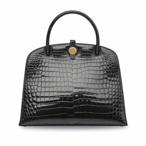 A SHINY BLACK POROSUS CROCODILE DALVY 25 WITH GOLD HARDWARE