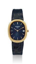 PATEK PHILIPPE. AN 18K GOLD OVAL WRISTWATCH WITH DATE, HOBNAIL BEZEL