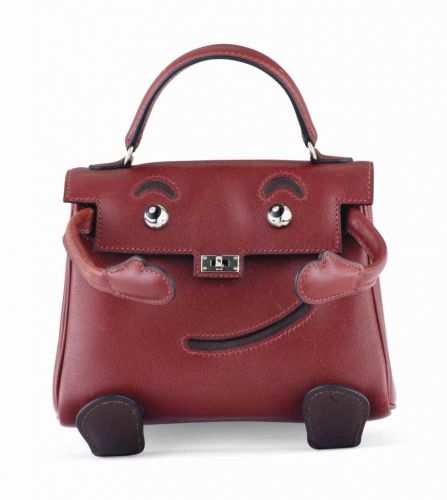SAC QUELLE IDOLE EN CUIR GULLIVER ROUGE H, GARNITURE EN MÉTAL ARGENTÉ PALLADIÉ, « KELLY DOLL »