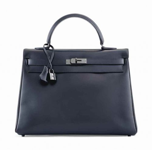 SAC KELLY SO BLACK RETOURNÉ 35 EN VEAU BOX NOIR, GARNITURE EN MÉTAL PLAQUÉ NOIR, ÉDITION LIMITÉE