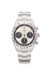 Rolex. A fine and rare stainless steel chronograph wristwatch with Paul Newman dial and bracelet