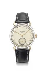 Patek Philippe. A very fine, rare and attractive stainless steel and 18K gold wristwatch with two-tone champagne dial