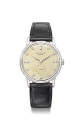 Patek Philippe. A very rare, attractive and elegant platinum automatic wristwatch with diamond indexes