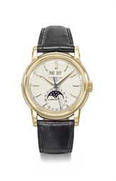 Patek Philippe. A fine and very rare 18k gold perpetual calendar wristwatch with sweep centre seconds and moon phases