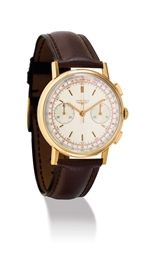 LONGINES. AN 18K GOLD FLYBACK CHRONOGRAPH WRISTWATCH