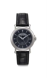 Patek Philippe. An 18k White Gold Automatic Wristwatch with Date, Center Seconds and Black Dial
