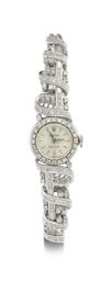 Rolex. A Lady’s 18k White Gold and Diamond-Set Bracelet Watch