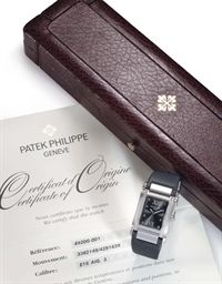 Patek Philippe. A Lady's 18k White Gold and Diamond-set Wristwatch