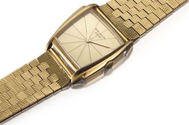 Patek Philippe. An 18k Gold Asymmetrical Wristwatch with Champagne Dial and Bracelet, Designed by Gilbert Albert and Retailed by Serpico Y Laino