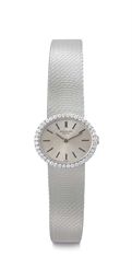 Patek Philippe. A Lady's 18k White Gold and Diamond-set Bracelet Watch